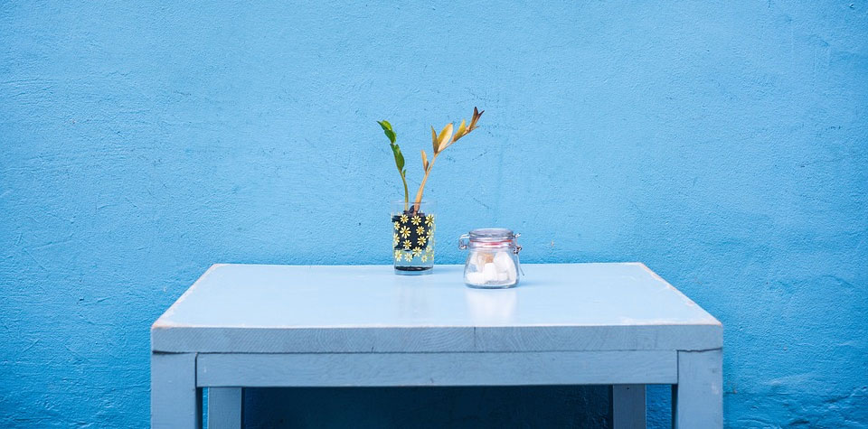 Blue wall with table